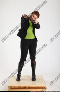 2012 01  NADIYA DUAL PISTOLS POSE1 00 B